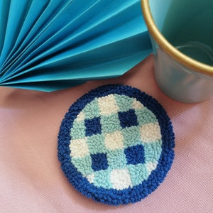 Punc needle mug rug