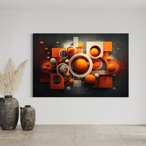 May include: Abstract art print featuring a geometric design with overlapping circles and squares in shades of orange, white, and gray against a dark background.