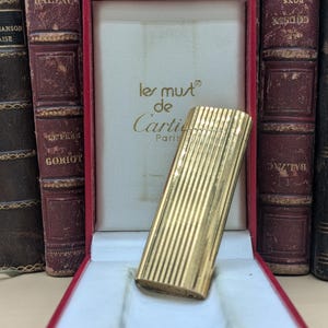 Cartier Paris gold-plated lighter in its box