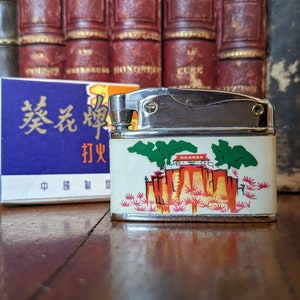 Isqueiro de gasolina de girassol, China, década de 1960