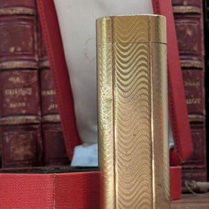 Cartier Paris gold-plated lighter in its box