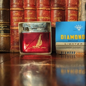 Diamond pink petrol lighter with sailing boat 1960/70s