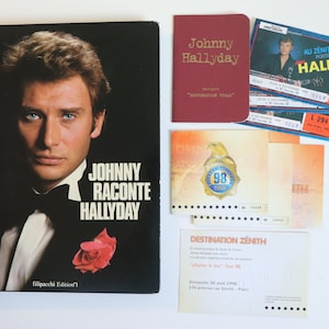 Johnny Halliday&#39;s autograph for Yves Mourousi in 1979 in his new book &quot;Johnny raconte Halliday&quot; with legendary concert tickets