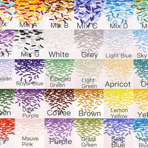 May include: A grid of thirty color-coded sections displaying small, cylindrical glass bugle beads. Each section features a specific color or mix, labeled with text including Mix A through F, White, Grey, Light Blue, Sky blue, Cerulean Blue, Royal Blue, Emerald Green, Light Green, Apricot, Cyan, Green, Dark Purple, Coffee, Brown, Lemon Yellow, Yellow, Orange Red, Mauve Pink, Purple, Grass Green, Sea Blue, and Peacock Blue.