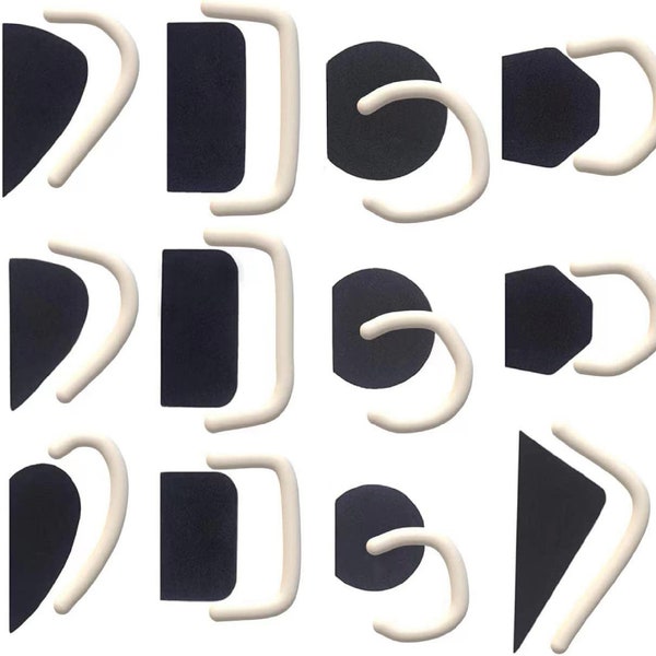 Set di 12 forme di maniglia della tazza in ceramica.Varie dimensioni e forme.Forma di ceramica. Manico della tazza. Forma per maniglia.