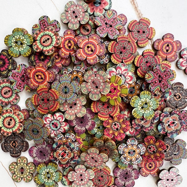 May include: A collection of colorful wooden buttons with intricate floral designs. The buttons are in shades of red, orange, yellow, green, blue, and purple.