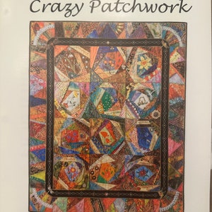 May include: A pattern booklet titled Crazy Patchwork by Alice Wilhoit Designs featuring a colorful, intricate quilt with various fabric scraps, embroidered details, and seasonal motifs arranged in a complex, multi-faceted patchwork layout.