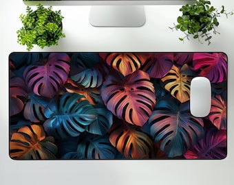 Tapete de escritorio con vibrantes hojas de monstera, decoración colorida para la oficina en casa.