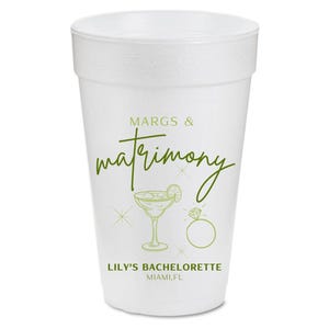 May include: White foam cup with green text that reads "Margs & Matrimony" with a green line drawing of a margarita glass and a ring. Below the text is "Lily's Bachelorette Miami, FL."