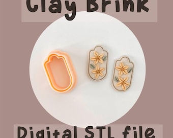May include: A set of three cookie cutters in the shape of a tag with flowers. The cutters are 1 inch, 1.25 inches, and 1.5 inches in size. The cutters are made of a light pink plastic. The image also includes the text "Clay Brink" and "Digital STL file".