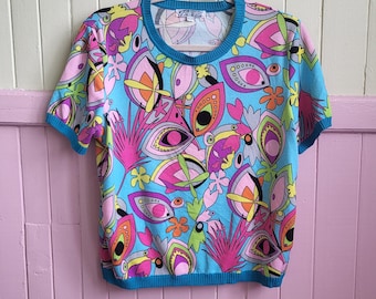 Vintage 70s Style All-Over Print Short-Sleeve Top in Blue with a Vibrant Abstract Floral and Eye Pattern. Size L. PARIS