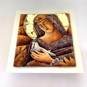 May include: A painting depicting a woman holding two white doves, with a gold leaf halo. The artwork uses warm, earthy tones and features the text "Two Turtledoves" at the bottom. The style is reminiscent of religious iconography.