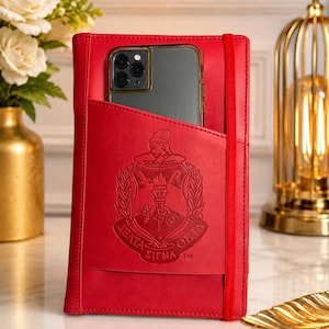 Delta Sigma Theta (ΔΣΘ) Sorority Artificial Leather NOTEBOOK- organizational shield print on front Red Color.