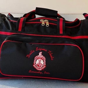 Delta Sigma Theta (DST) Red & Black color Trolley/ Duffle/ Luggage Bag for travelling.- authorized vendor