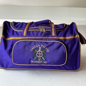 Omega Psi Phi Fraternity Royal Purple & Old Gold color Trolley/ Duffle/ Luggage Bag for travelling.- authorized vendor