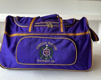 Omega Psi Phi Fraternity Royal Purple & Old Gold color Trolley/ Duffle/ Luggage Bag for travelling.- authorized vendor