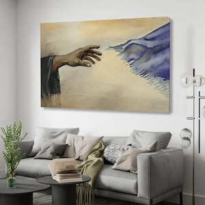 May include: Watercolor painting depicting a hand reaching towards a blue and purple form, set against a beige background. The artwork is a rectangular canvas, suitable for wall decor. The image is displayed above a gray sofa.