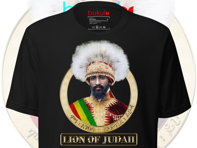 May include: Black t-shirt with a gold circle featuring a portrait of a man wearing a white fur hat and a gold and red robe. The text "LION OF JUDAH" is printed in gold below the circle.