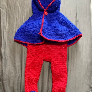 Baby set bodysuit and poncho with hood.