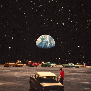 May include: A vintage car parked on a gray, rocky surface with a view of Earth in the distance. The car is a light beige color with a black roof and a black bumper. The car is surrounded by other vintage cars and people standing around. The sky is black with stars.