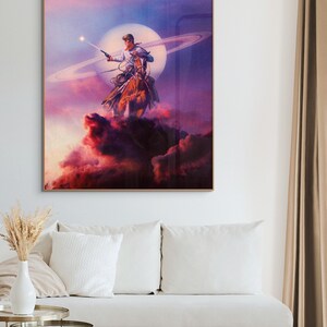 May include: A cowboy riding a horse through a purple and pink sky with a ring of clouds around a bright white moon. The cowboy is holding a gun and is looking to the right.
