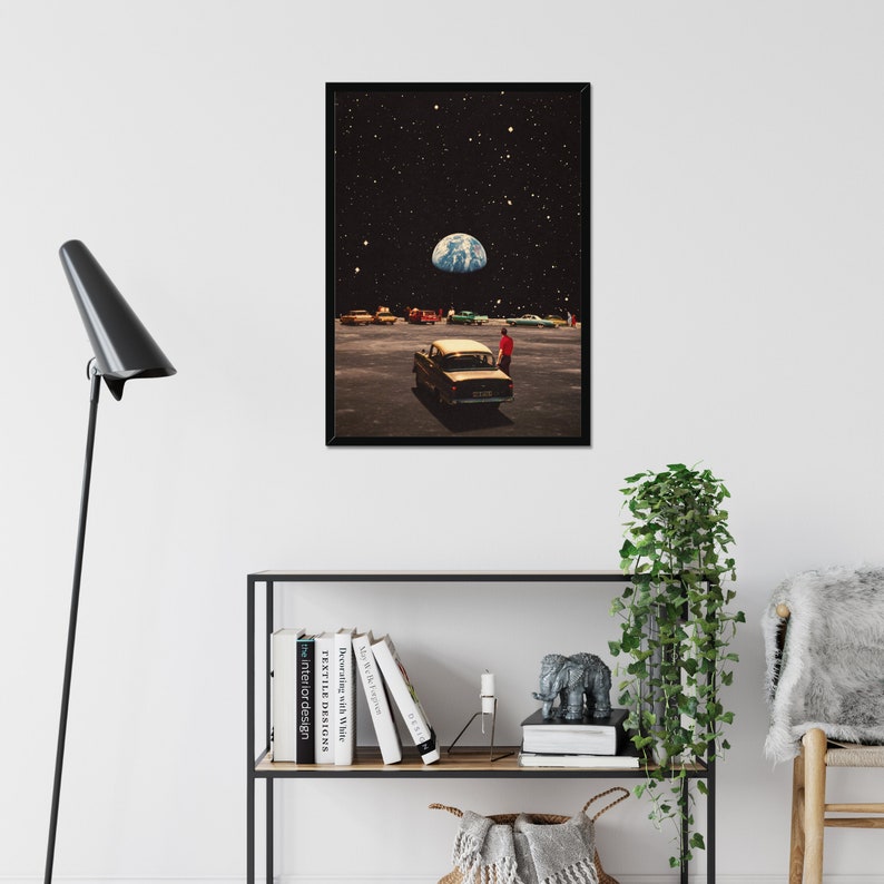 May include: A retro-style collage art print featuring a vintage car parked in a deserted lot with a view of Earth in the night sky. The print has a vintage aesthetic and a surreal feel.