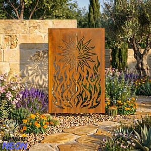 May include: A rectangular metal garden screen with a rusted finish featuring a laser-cut design of a stylised sun positioned above a pattern of vertical flames. The panel stands upright in a garden setting among various plants and stones.