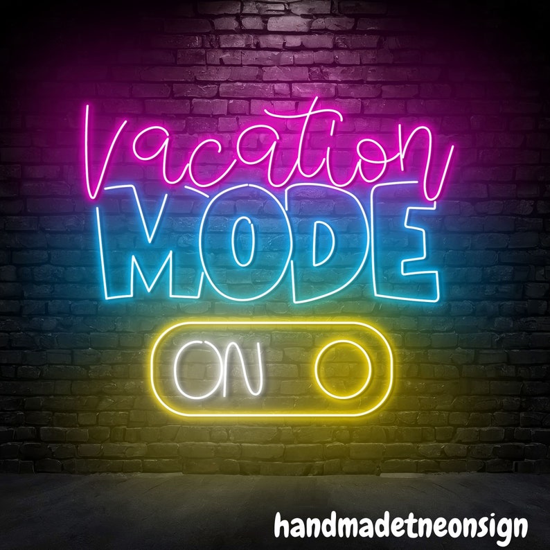 May include: Neon sign with the text "Vacation Mode On" in pink, blue, and yellow on a brick wall background.