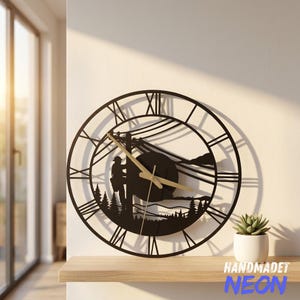May include: A circular black metal wall clock featuring a cutout silhouette of a utility worker on a pole, power lines, and pine trees. The clock face displays Roman numerals and has gold-colored hour, minute, and second hands.
