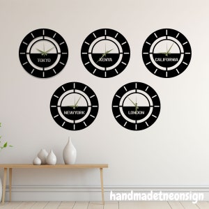 Reloj de zona horaria mundial Reloj de pared de metal negro personalizado Reloj de pared moderno Regalo de inauguración de la casa para la oficina Reloj de ciudad Reloj de zona horaria familiar para viajes