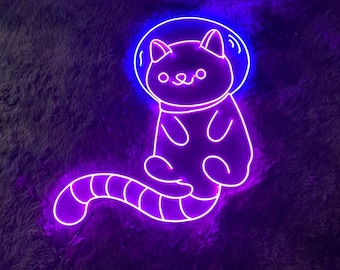 May include: A purple neon sign of a cat wearing a space helmet. The cat is sitting with its tail curled around its body.