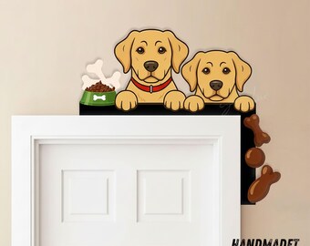 May include: A decorative door topper featuring two cartoon golden retriever dogs peeking over a black surface. The dogs have brown eyes and red collars. A green dog bowl with a bone and food is on the left. The words "HANDMADET NEON" are at the bottom.