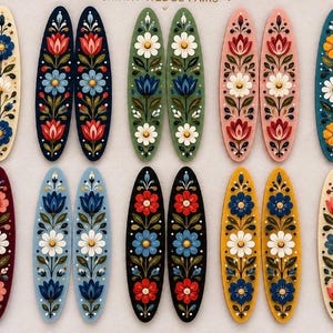 Könnte beinhalten: Eine Sammlung von zwölf ovalen Haarspangen in zwei Reihen, jede mit einem einzigartigen handbemalten Blumenmuster in leuchtenden Farben wie Blau, Rot, Grün, Rosa, Gelb und Schwarz, die symmetrische botanische Motive zeigen.