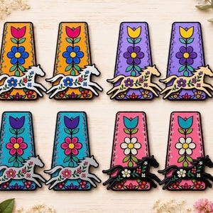 May include: Eight rectangular bookmarks arranged in two rows, each featuring a vertical floral pattern and a leaping horse silhouette. The designs include orange, purple, blue, and pink backgrounds with colorful flower motifs and horses.