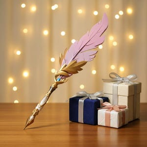 May include: A decorative pen with a pink feather design and gold accents. The pen is placed in front of three gift boxes with silver and pink ribbons. The background features soft, out-of-focus lights.