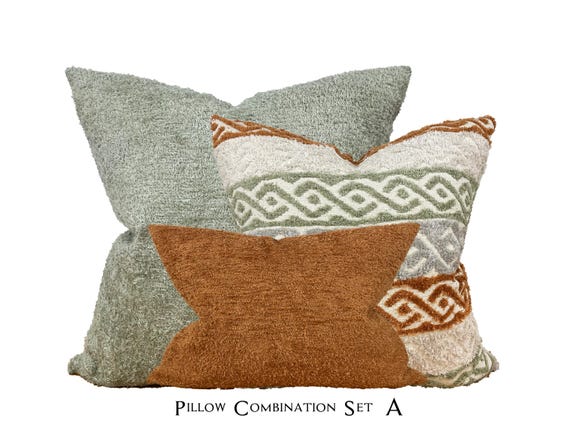 Rust and green throw pillows deals
