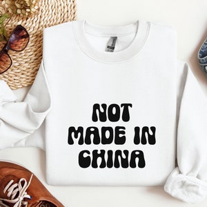 Not made in China Sarcastic Slogan Sweatshirt Conscious Consumerism Sweater Eat Local Funny Anti capitalist Support Local businesses shirt