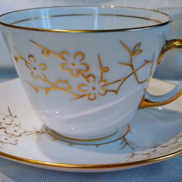 Spode cup and saucer in the Blanche de Chine pattern gold and white, made in England, tea cup and saucer, collectors item