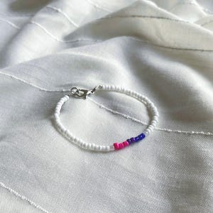 Pride Collection | bi flag bracelet | beaded in blue, violet and pink | simple pride jewellery | every sale a donation