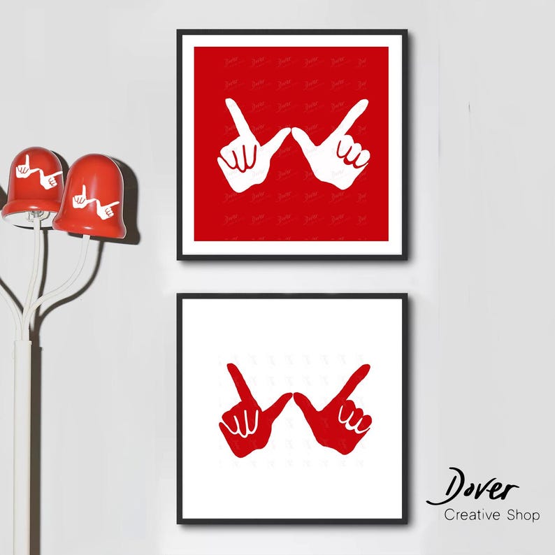 May include: Two framed prints with a white background and red hand gestures. The hand gestures are in the shape of a 'W' with the fingers pointing up. The top print has a red background and the bottom print has a white background. The text 'Dover Creative Shop' is in the bottom right corner of the image.