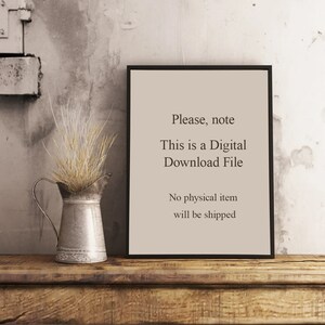 May include: A black framed sign with white text that reads "Please, note This is a Digital Download File No physical item will be shipped". The sign is sitting on a wooden surface with a small metal pitcher and dried grass.