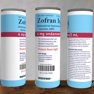 May include: Three cylindrical vials of Zofran Injection, each with a blue and white label and a red band. The labels display text including the drug name, dosage (4 mg), and instructions. The vials are for intramuscular or intravenous use.
