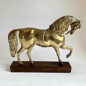 Vintage Brass horse on wooden foot- half 20th century
