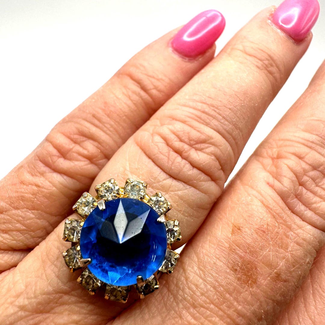 Vintage Gold Tone Clear Rhinestone Ring With Blue Cabachon Center Stone ...
