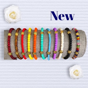 Gold Evil Eye Bracelet: Czech Seed Bead Stretch Bracelet