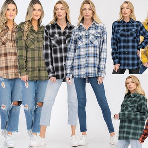May include: A collection of plaid flannel shirts in various colors, including black, brown, green, blue, yellow, and orange. The shirts are long-sleeved and have a button-down front.