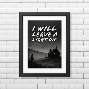 May include: A black and white illustration of a house with a single lit window. The text "I WILL LEAVE A LIGHT ON" is written in white on a black background.