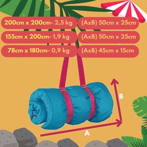 May include: A rolled-up blue sleeping pad with pink straps hanging from the ceiling. The pad is 200cm x 200cm and weighs 2.5 kg. It is also available in smaller sizes: 155cm x 200cm (1.9 kg) and 78cm x 180cm (0.9 kg).
