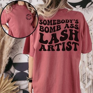 Somebody&#39;s Bomb Ass Lash Aritst Shirt, Lash Tech T-shirt, Comfort Colors Shirt, Gift For Lash Artist, Eyelash Technician Shirt, Eyelash Tech