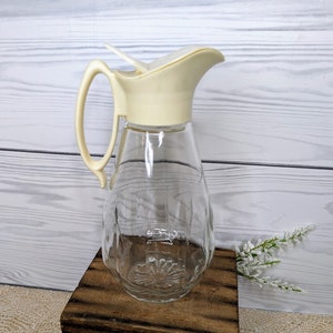 Vintage Beige and Clear Glass Syrup Pitcher